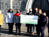 The presentation of funds to Ardfert/Kilmoyley Parish for the purchase of webcams.