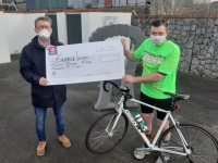 Tommy Sheehy (right) presents a cheque for over €12,000 to Sean Scally of Enable Ireland on Friday morning.