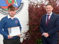 Causeway Comprehensive school student Keith Flynn with Principal Cathal Fitzgerald.