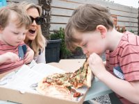 Tucking into their ‘Fun Guy Pizza’ at ‘Taste of Ballyseedy’ were brothers Matthew and Issac and their Mum Jackie McDonnell. 