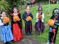 Tralee Educate Together pupils holding some of the carved pumpkins at the school on Friday. Photo by Dermot Crean