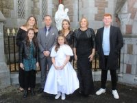 Bree Rogers with Madison, Brogan, Gordon, Taylor and Geraldine Rogers with Sean O'Donnell, at Presentation Primary School's First Holy Communion Day on Saturday at St John's Church. Photo by Dermot Crean