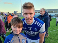 Eamon Murphy, Kerins O’ Rahilly U9 just over the moon to have his photo taken with one of his heroes, the great Tommy Walsh.