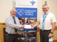 Sean Lyons, Chairperson of Tralee International Resource Centre receiving funding from Owen McCarthy, Head of Mission on behalf of the Bon Secours Hospital. Photo by Dermot Crean