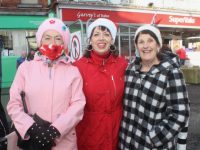 Bernadette O'Callaghan, Antoinette McGrath and Maria McGrath at the Bill Kirby Memorial Walk from Kirby's Brogue Inn on St Stephen's Day. Photo by Dermot Crean