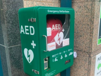The damaged defibrillator on Ashe Street.