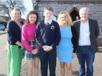 Darragh Field with Linda, Charlotte, Tara and Sean Field at the Caherleaheen NS Confirmation Day at the Immaculate Conception Church on Saturday. Photo by Dermot Crean