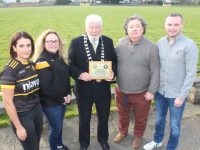 Hannah Armstrong and Kimberly Robertson of East Belfast GAA, Mayor Johnnie Wall, Eddie Barrett of Austin Stacks and Fergal  Hegarty of East Belfast GAA at the Austin Stacks clubhouse on Saturday. Photo by Dermot Crean