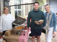 Jane Boyle of The Ashe Hotel serves up some sliders' to Colin O'Mahony and Lorraine Gurnett on the Taste Trail on Saturday. Photo by Dermot Crean
