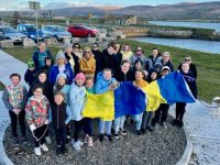 Pupils from Blennerville NS fifth class with parents about to set off on a 5k fundraising walk from the Lock Gates for Ukrainian refugees in Tralee.