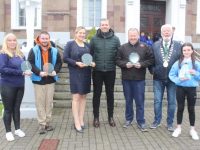 Mayor of Tralee Johnnie Wall and President of Tralee Chamber Nathan McDonnell with representatives of winning entries in the St Patrick's Day Parade. From left; Colette Price of The Boys Brigade, Shauna O'Donoghue of Ballygarry Estate, John Murray of The Chain Gang Cycling Club and Tara Slattery of Cill Dubh Brownies and Guides. Photo: Dermot Crean