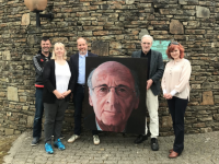 Artistic Director Jonathan Kelliher, Lisa McElligott from the Board of Directors, Chairman of the Board of Directors Seán Murphy, artist Henk Heideveld, and Executive Director Róisín McGarr receiving a donation of the artist’s portrait of Siamsa Tíre’s founder, Fr Pat Ahern.