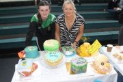 Lucy and Suzanne Grattan with some of the 20th birthday cakes at the Mercy Mounthawk Garden Fete on Sunday. Photo by Dermot Crean