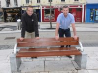David Scott of Tralee Chamber Alliance with Colm Nagle of Kerry County Council in front of one of the two new benches in The Square. Photo by Dermot Crean