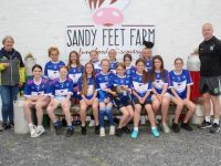 The Under 12 Girls enjoyed a trip to the teams' sponsors, Sandy Feet Farm last week. Pictured with the girls is Eleanor Wall of Sandy Feet Farm and Declan Quill of Kerins O'Rahillys. Photo by Dermot Crean