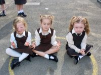 Junior infants taking some time to meditate on their first day at Gaelscoil Mhic Easmainn on Wednesday. Photo by Dermot Crean