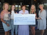Mary Fitzgerald of Comfort For Chemo Kerry receiving the cheque of €6,517 from Trish Griffin, Bronagh Shiel, Erin Flanagan and Lorraine Flanagan. Photo: Dermot Crean