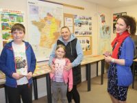 French teacher Anne Marie O'Kelly (right) with Samuel Gallagher, Abigail Gallagher and  Michelle Reidy Gallagher at the Coláiste Gleann Lí open evening on Thursday. Photo by Dermot Crean