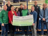 Representatives from Banna Rescue and the Irish Heart Foundation receiving cheques at Tralee Boxing Club.
