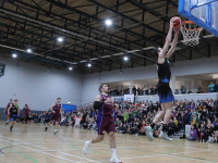 Eoin Quigley dunks a score Photo by Liam Ryan