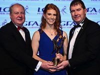 Louise Ní Mhuircheartaigh of Kerry is presented with her TG4 LGFA All Star award by Ard Stiúrthóir TG4 Alan Esslemont, left, and President of the LGFA Mícheál Naughton during the TG4 All-Ireland Ladies Football All Stars Awards banquet, in association with Lidl, at the Bonnington Dublin Hotel. Photo by Eóin Noonan/Sportsfile
