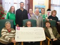 Na Gaeil Club members with St Patrick's Day Care Centre staff and service users at the presentation of a cheque for €700 to be used for activities at the centre. Photo by Dermot Crean