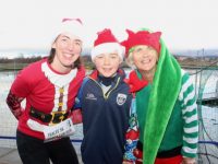 Mary and Jake Barrett with Breda Quirke at the Santa 5k Fun Run at the Tralee Bay Wetlands on Sunday. Photo by Dermot Crean