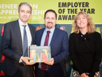 Pictured with their award is John Harty of Dairymaster with Minister Simon Harris TD and NAO Director, Dr Mary Liz Trant.