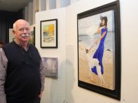 Paudie Lynch with his painting 'Watch The Birdie' at the Tralee Art Group 'Light' exhibition at Tralee Library on Thursday evening. Photo by Dermot Crean