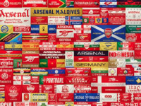 The 'We All Follow Arsenal' banner which features the Arsenal Tralee Supporters Club flag.
