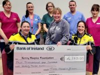 Staff from the Palliative Care Unit with Andrea O'Donoghue (front, centre) of Kerry Hospice with Garda Cathy Murphy and Garda Trish Fitzpatrick at the presentation of a cheque on Thursday.