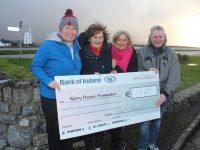 Tom Quane presents a cheque for €1,845 to Andrea O'Donoghue and Mary Shanahan of Kerry Hospice with Kerry Hospice ambassador Deirdre Walsh. Photo by Dermot Crean