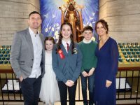 Sophie Quillinan with dad Wayne, siblings Paige and Jamie and mom Mags Quillinan at the Scoil Eoin Balloonagh Confirmation Day in Our Lady and St Brendan's Church on Thursday. Photo by Dermot Crean. Prints available — call 087-9384810