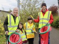 Anne Marie Fuller and Patrick Falvey with Ailbhe and Orla Falvey taking part in the County Clean-Up on the Greenway in Tralee on Saturday. Photo by Dermot Crean