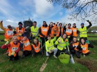 JRI America staff with Tralee Tidy Towns volunteers planting trees on Friday.