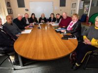 Kerry County Council Writer in Residence, Máire Holmes (centre) about to begin her class with the Castleisland based Scríobhneoirí Sliabh Luachra Writers Group. Included are from left: Frank Kevins, Ray Canoy, Micheál O'Shea, Jimmy Cullinane, Helen Blanchfield, Ms. Holmes. Cáit Curtin, Billy O'Connor, Liam Cummins, Anna Brosnan and Maria O'Brien. Photograph: John Reidy
