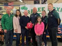 Seamus O'Mahoney presents the defibrillator to  Richard O'Halloran of the St Brendan's Park Residents Association on Sunday.