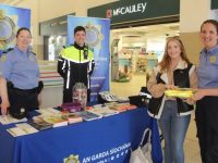 Keeva Murphy receives a safety pack from Garda Patricia Fitzpatrick (right) at the Bike Safety stand at Manor West on Wednesday. Also included is Garda Cathy Murphy and Garda Gearóid Sayers. Photo by Dermot Crean