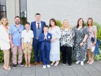 Conor Lyons and family at the Holy Family NS First Holy Communion Day on Saturday. Photo by Dermot Crean