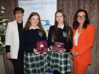Minister for Education Norma Foley and Principal of Presentation Tralee Mairead Finucane with students Ciara Sharp (Leadership Award and Nano Nagle Award) and Adra Kongjoni (Leadership Award) at the Presentation Secondary School Tralee awards night on Thursday. Photo by Dermot Crean