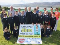 Launching the Donal Walsh Spa 6k Challenge were pupils joined by Mary Ann Foley, Fionnbar Walsh, Geraldine Behan, Niamh Murphy, Principal Peter Linehan, Jenny Galvin, Rebecca Ryan and Mary Griffin Crowe. Photo by Dermot Crean
