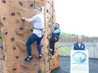 Ciara Griffin (left) with Jacinta Bradley and Marisa Reidy of Recovery Haven at the Wetlands climbing wall. Ciara will abseil down Thomond Park in aid of the charity. Photo by Dermot Crean