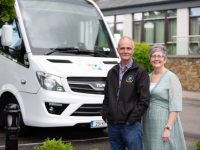 Mike Brosnan (driver) and Breda Dyland (Manager) pictured on Sunday in front of the new Kerry Cancer Support Group - Health Link Transport wheelchair accessible Cork bus during the official launch at The Rose Hotel. Photo: Michelle Breen Crean Photography