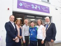 CEO of DSI Barry Sheridan, Asst Manager of Down Syndrome Kerry 321 shop Grace O'Donnell, President of DSI Gerard O'Carroll, Special Olympics medal winner Ryan Griffin, Manager of Down Syndrome Kerry 321 shop Rachel Fitzgerald and Mayor of Tralee Johnnie Wall at the opening of the Down Syndrome Kerry Shop on Friday evening. Photo by Dermot Crean
