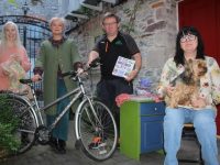 Looking forward to the Pop Up Repair Shop at Maddens this Saturday were Anne Marie Fuller of Tralee Tidy Towns, Edel Casey, Brendan O'Brien of Tralee Tidy Towns and Rebekah Wall of Maddens (holding Maggie). Photo by Dermot Crean