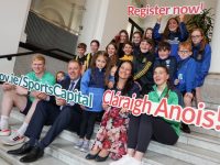 Champion boxer Aoife O'Rourke, Minister Catherine Martin, Minister of State Thomas Byrne, Ireland under-20 rugby player Jamie Osborne and children from Dunshaughlin Youth soccer club, Dunshaughlin athletics club (both Meath) and Rosemount Mulvey FC (Dublin), at the launch of the 2023 Sports Capital and Equipment Fund, Government Buildings, 10 July 2023