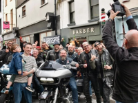 Tony McMahon in front with the Barbersride bikers outside his business on Russell Street on Tuesday. Photo: Barbersride Instagram