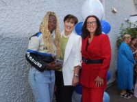 Zoe Ncube is congratulated on her Leaving Cert results by Minister Norma Foley and Principal of Presentation Secondary Tralee Mairead Finucane on Friday morning. Photo by Dermot Crean