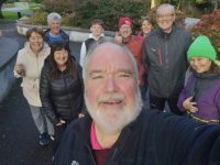 James Finnegan with friends and family on his 1,000 day of walking at the Town Park on Thursday.