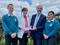 Minister Norma Foley with Mercy Mounthawk Principal John O'Roarke, students Ethan Fitzgerald and Head Girl Kim McTigue.